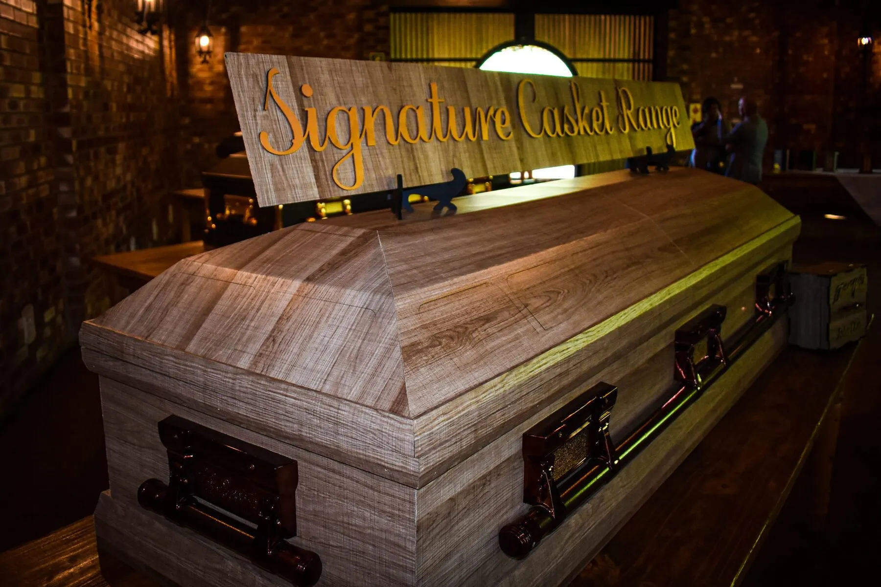 Signature Casket Range in natural oak finish